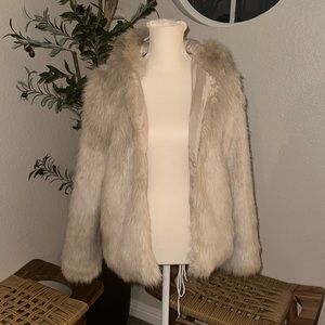 Hooded fur coat